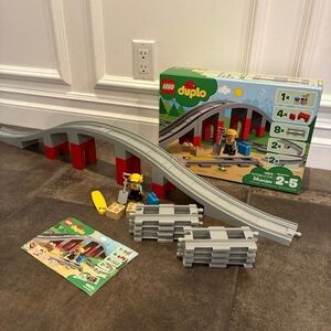 Lego Duplo Train Bridge and Tracks Set #10872
Like New. No missing pieces.